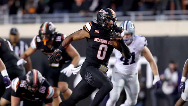Oklahoma State's Ollie Gordon II (0) runs the ball in the first half of the college football game between the Oklahoma State University Cowboys and the Kansas State Wildcats at Boone Pickens Stadium in Stillwater. Okla., Friday, Oct. 6, 2023. OSU won 29-21.